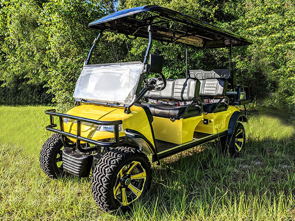 Yellow Evolution 6 Passenger Lifted Golf Cart